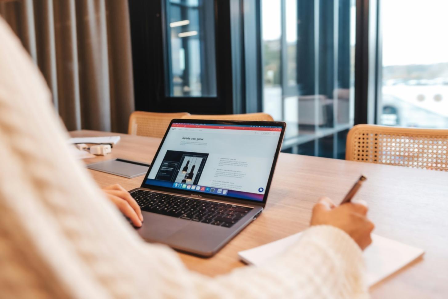 Participants working through AI marketing tools during a live session